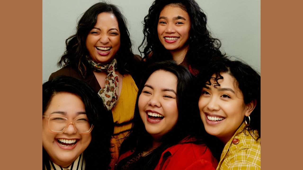 five women smiling